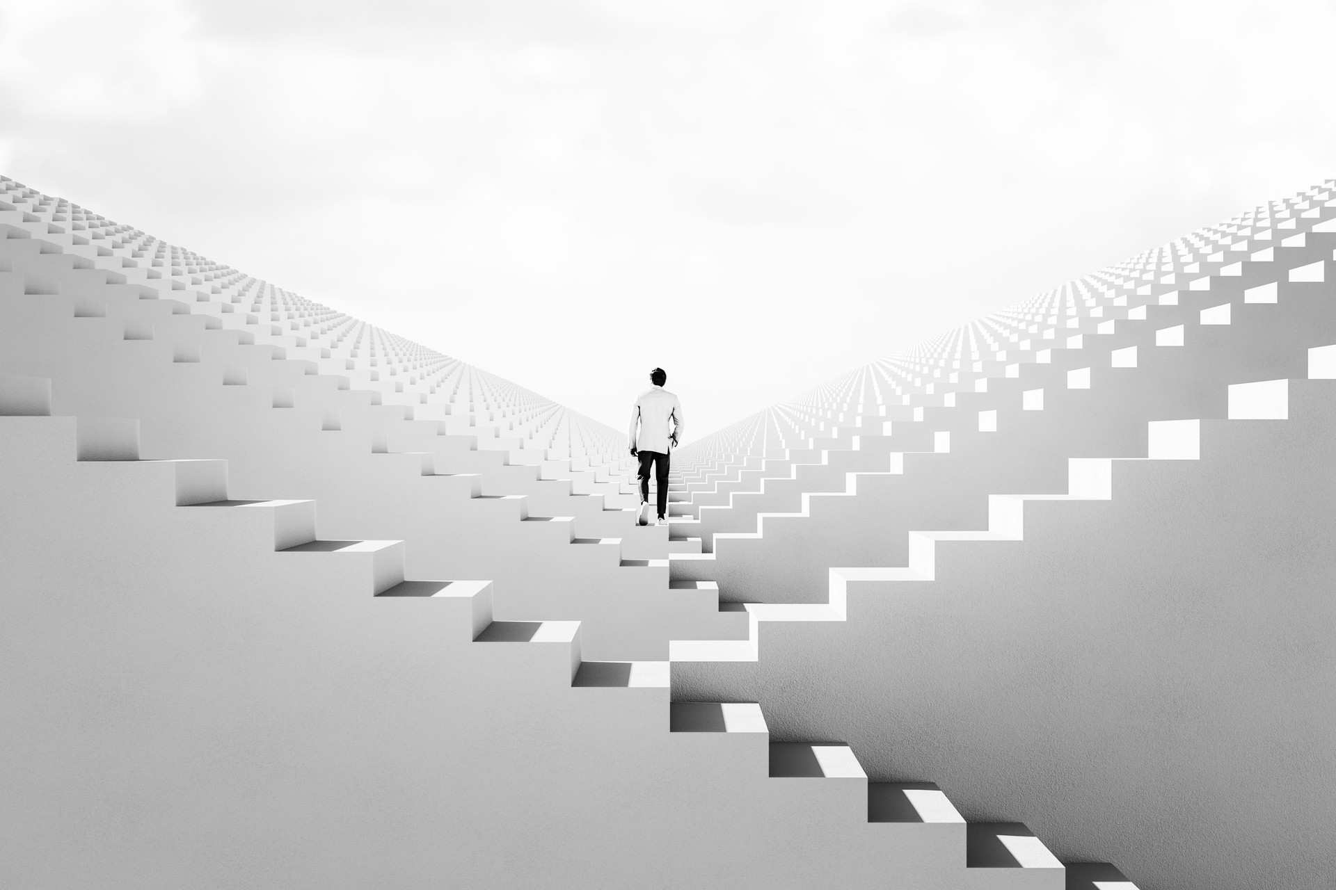 Businessman walking between endless abstract  stairs